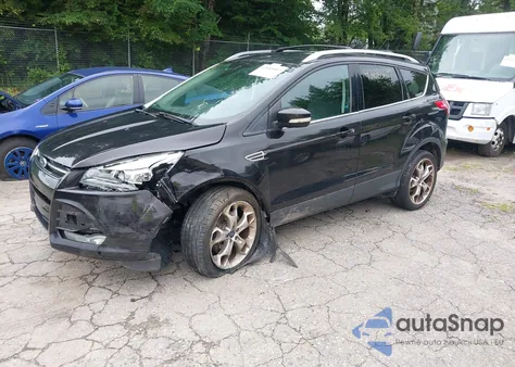 2013 Ford Escape Titanium z USA, uszkodzony, nr VIN 1FMCU9J91DUC65913